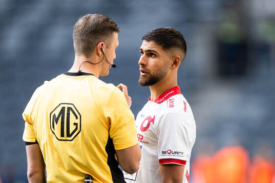 Domare Erik Mattsson och Degerfors Omar Faraj