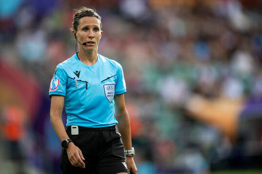 Referee Silvia Gasperotti of Italy