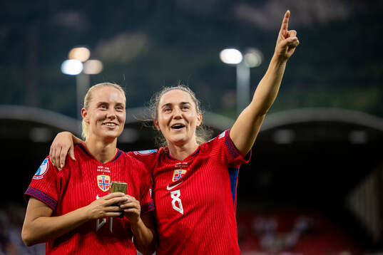 Lisa Naalsund and Vilde Bøe Risa of Norway celebrate