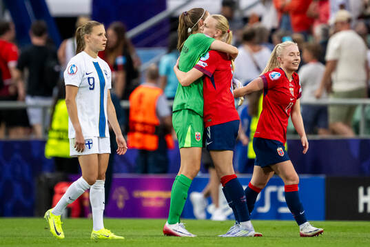 Katariina Kosola of Finland looks dejected and goalkeeper