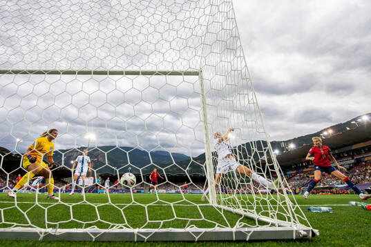 Goalkeeper Anna Koivunen and Nea Lehtola of Finland sees