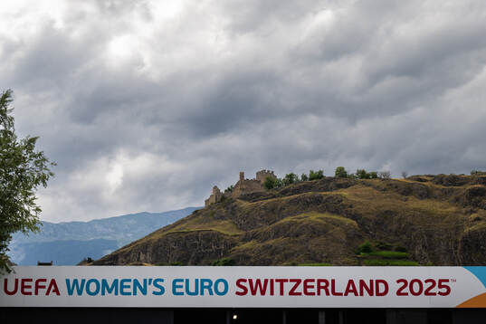 A sign for the tournament with a castle
