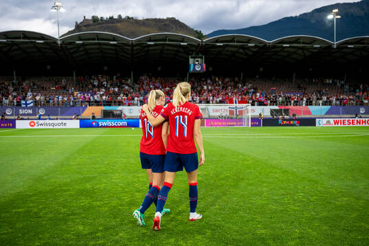 Mathilde Harviken and Ada Hegerberg of Norway celebrate