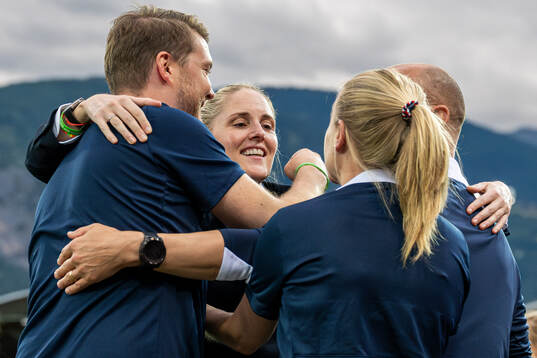 Gemma Grainger, head coach of Norway, celebrates with staff