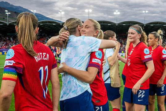 Elisabeth Terland and Lisa Naalsund of Norway celebrate