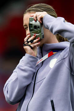 Elisabeth Terland of Norway with a camera