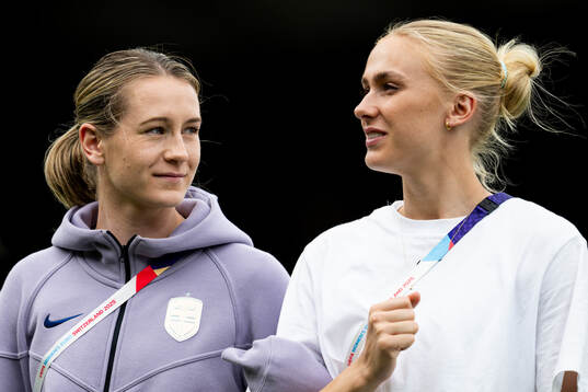 Elisabeth Terland and goalkeeper Selma Panengstuen of Norway