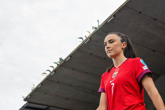 Ingrid Syrstad Engen of Norway enters the pitch