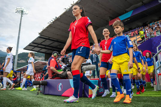 Ingrid Syrstad Engen of Norway enters the pitch