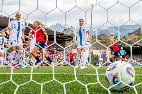 Frida Maanum and Ada Hegerberg of Norway celebrate
