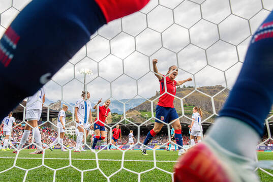 Ada Hegerberg and Guro Reiten of Norway celebrate