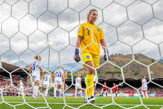 Goalkeeper Anna Koivunen of Finland looks dejected