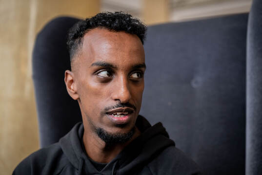 Taha Ali is being interviewed
