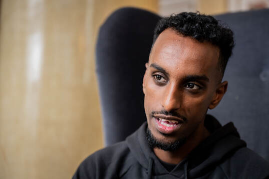 Taha Ali is being interviewed