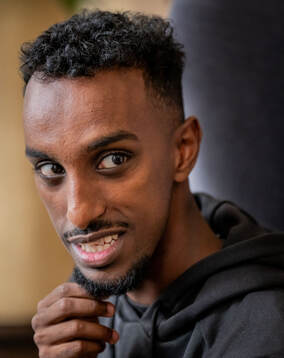 Taha Ali is being interviewed