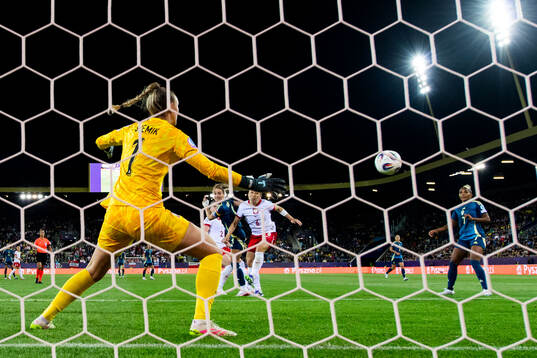 Kosovare Asllani of Sweden scores 0-2 behind goalkeeper