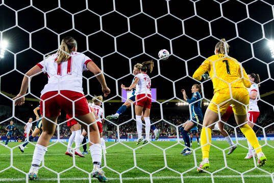 Lina Hurtig of Sweden scores 0-3 behind goalkeeper Kinga
