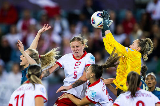 Amanda Ilestedt of Sweden against Oliwia Wos and goalkeeper