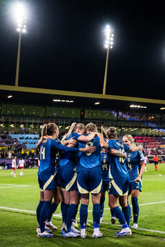 Lina Hurtig of Sweden celebrate with teammates