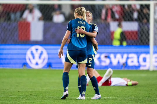 Fridolina Rolfö and Jonna Andersson of Sweden celebrate