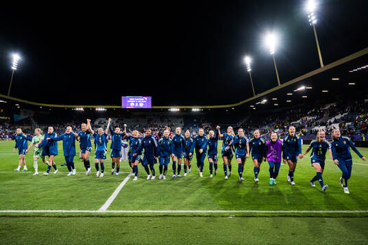 Players of Sweden celebrate