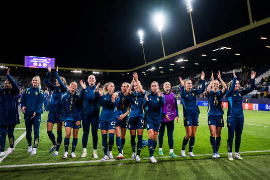 Players of Sweden celebrate