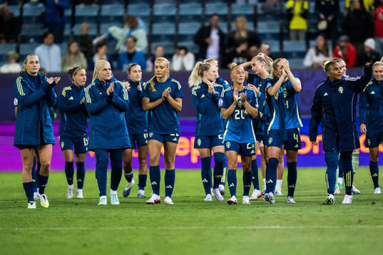 Players of Sweden celebrate