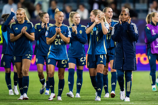 Players of Sweden celebrate