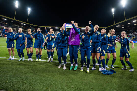 Players of Sweden celebrate
