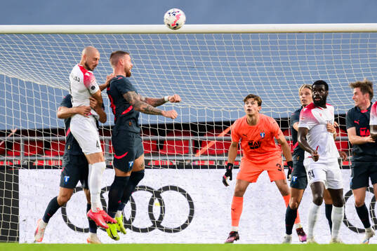 Pontus Jansson and goalkeeper Melker Ellborg of Malmö FF