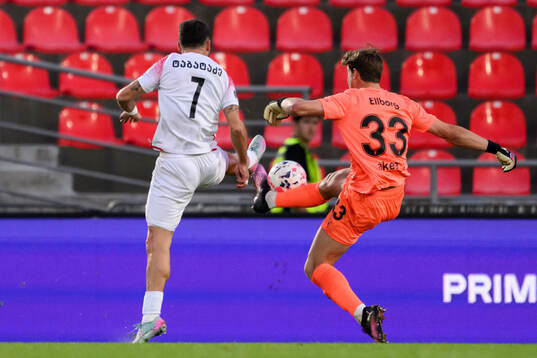 Iuri Tabatadze of FC Iberia and Melker Ellborg of Malmö FF