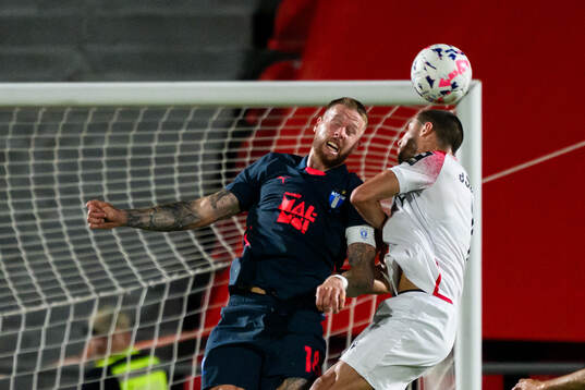 Pontus Jansson of Malmö FF and Amirani Dzagania of FC