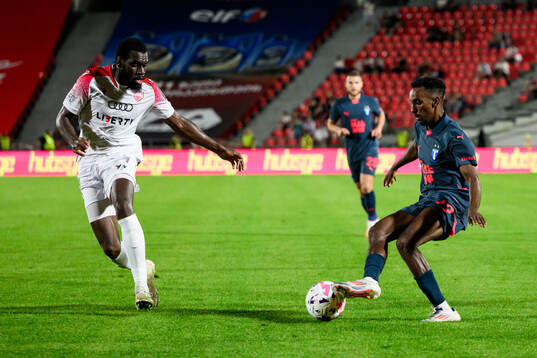 Derek Agyakwa of FC Iberia and Taha Ali of Malmö FF