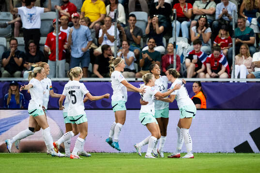 Sveindis Jonsdottir of Iceland celebrates with team mates