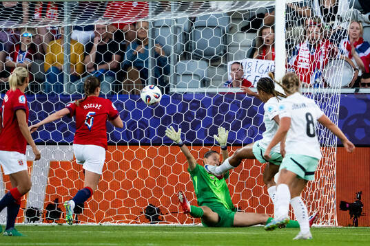 Sveindis Jonsdottir of Iceland scores behind goalkeeper