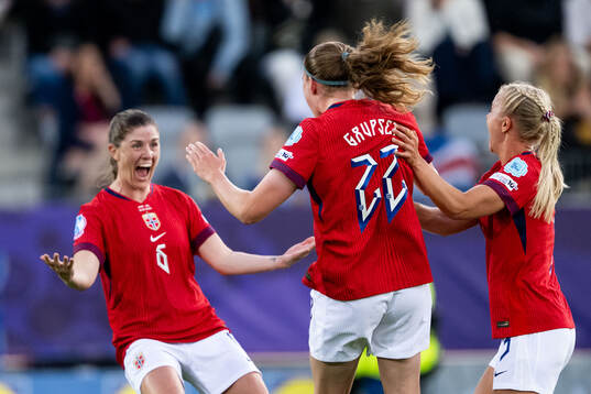 Signe Gaupset of Norway celebrates with Maren Mjelde