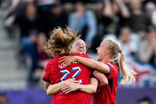 Signe Gaupset of Norway celebrates with Elisabeth Terland