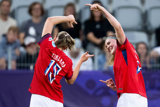 Signe Gaupset of Norway celebrates with Elisabeth Terland