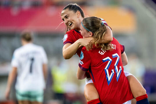 Signe Gaupset of Norway celebrates with Vilde Bøe Risa