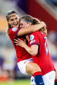 Signe Gaupset of Norway celebrates with Vilde Bøe Risa and