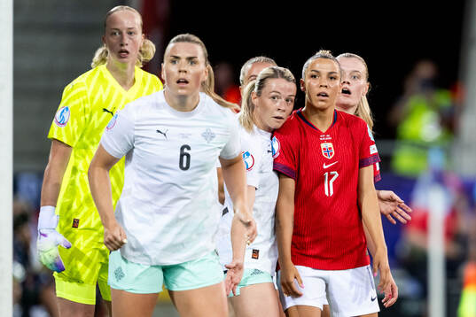 Ingibjörg Sigurdardottir and goalkeeper Cecilia Rán