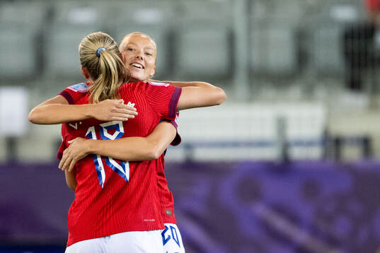 Frida Maanum of Norway celebrates with Synne Sofie Kinden