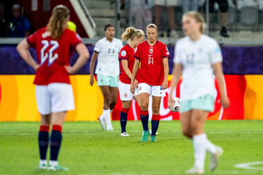 Lisa Naalsund of Norway looks dejected