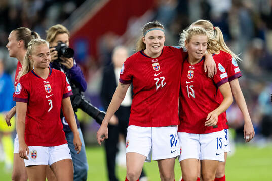 Signe Gaupset and Justine Kielland of Norway celebrate