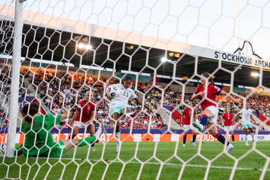 Sveindis Jonsdottir of Iceland scores 1-0 behind goalkeeper