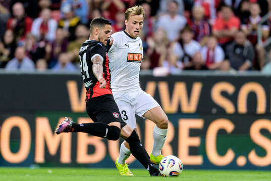 Kristian Kostrna of Spartak Trnava and Sigge Jansson of