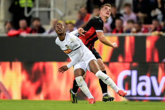 Sanders Ngabo of Häcken and Libor Holik of Spartak Trnava