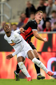 Sanders Ngabo of Häcken and Libor Holik of Spartak Trnava