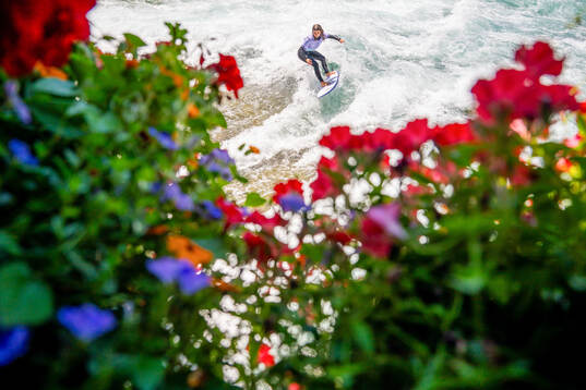 A surfer with the Norwegian away kit