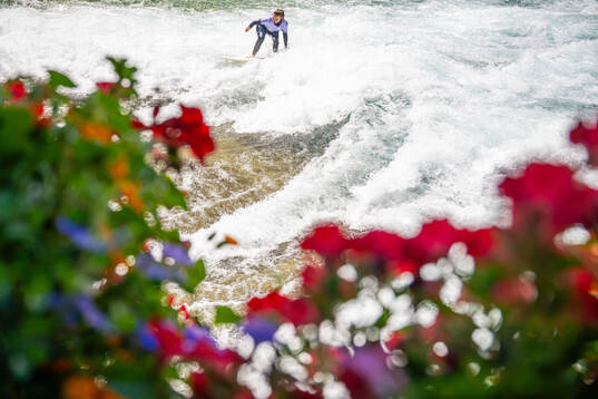 A surfer with the Norwegian away kit